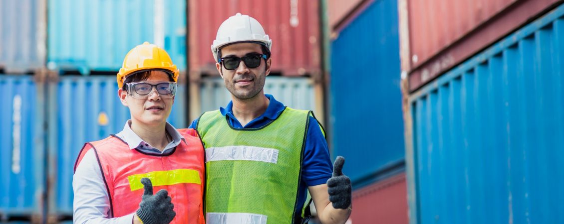 staff-and-foreman-control-loading-container-cargo-working-team-happy-enjoy-working-standing-smile-hand-show-thumbs-up