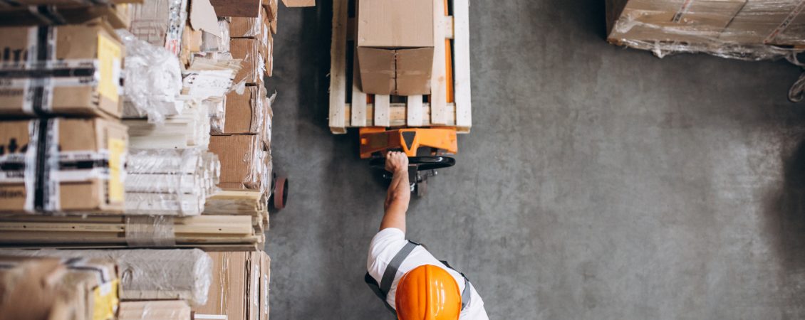 young-man-working-at-warehouse-with-boxes (2)